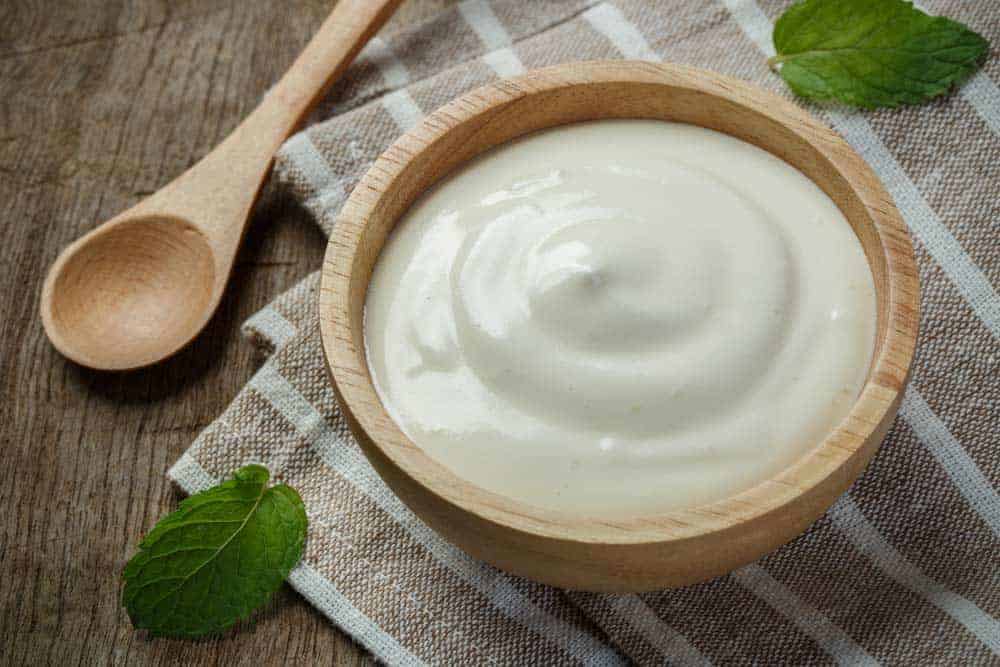 The Risks Of Eating Unrefrigerated Yogurt