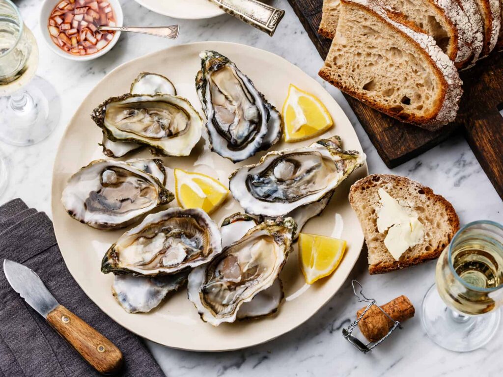 https://www.cookingchanneltv.com/recipes/sarah-sharratt/grilled-oysters-with-parsley-and-garlic-butter-3576316